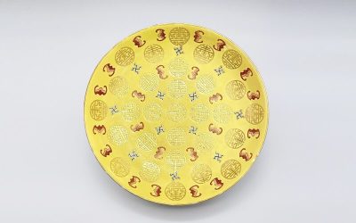 A good and rare yellow ground famille rose ‘Longevity’ dish