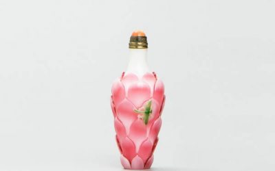 A fine and rare white ground pink overlay lotus-shaped snuff bottle